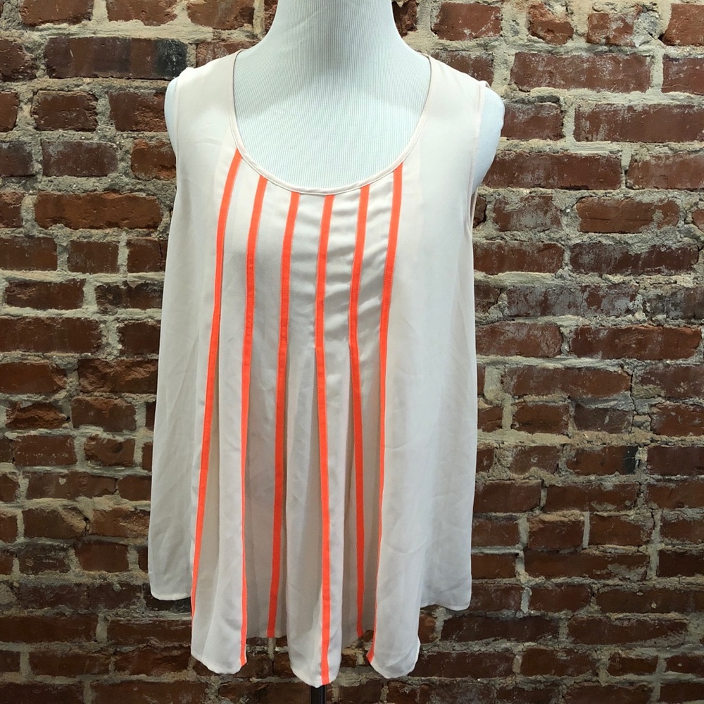Blush sleeveless blouse.